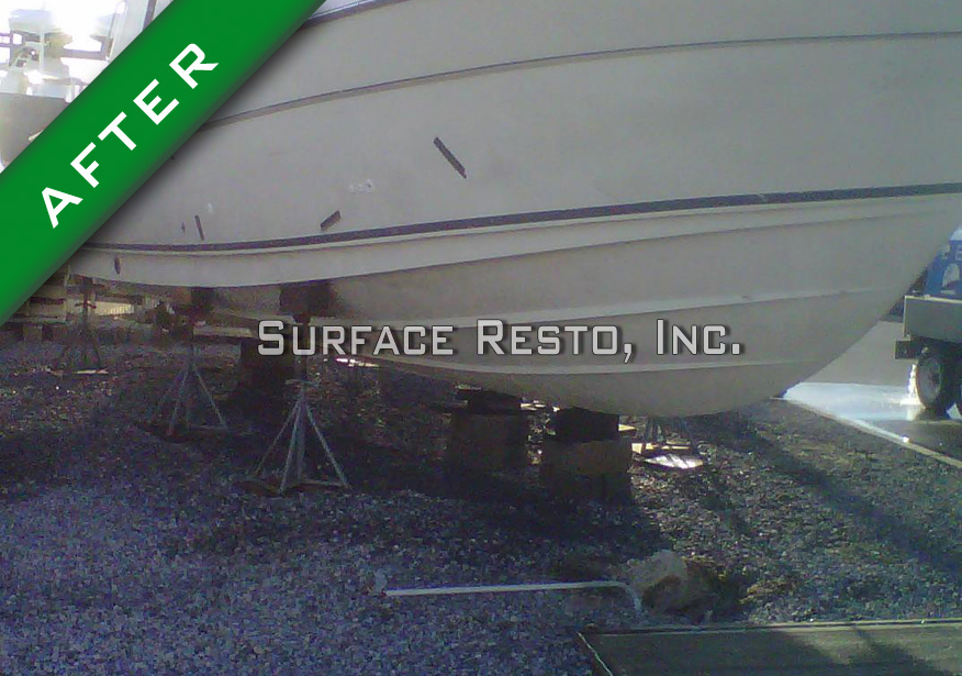 Clean New York boat hull on stands after paint removal