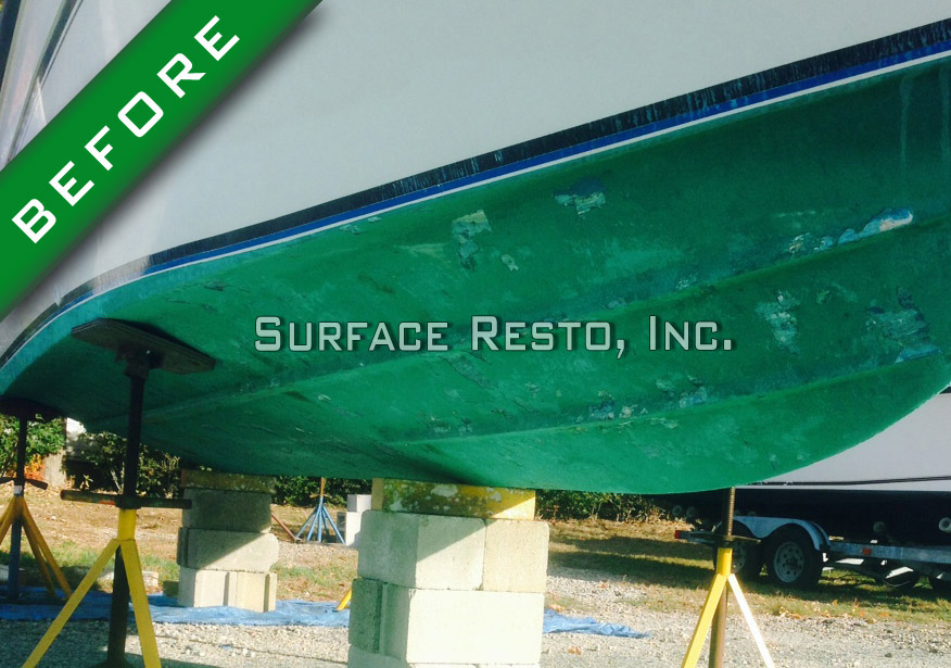 Green bottom paint on a boat hull in Connecticut before removal