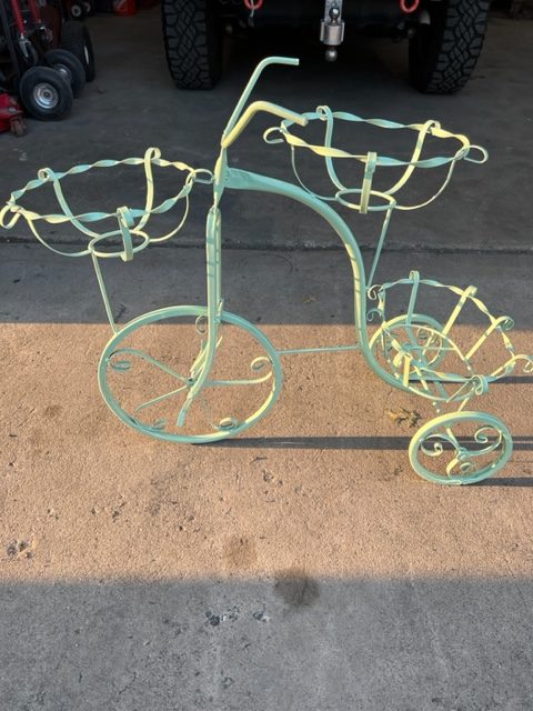 Tricycle planter finished in mint green powder coat