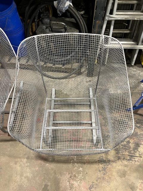 Wire mesh patio chair stripped to bare metal before powder coating